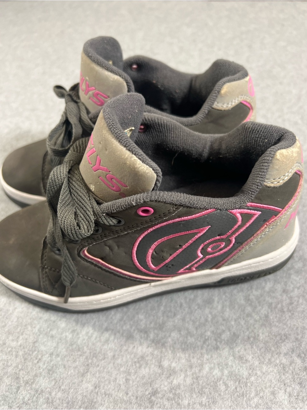 Heely’s Black and Pink High-Top Skate Shoes